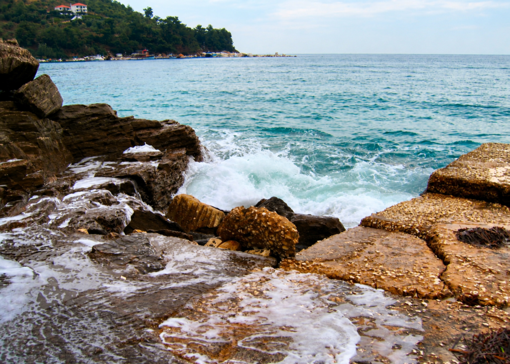 Waves breaking over coastal rocks in Thassos